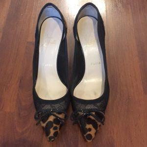 Louboutin lace/pony hair bow front pumps